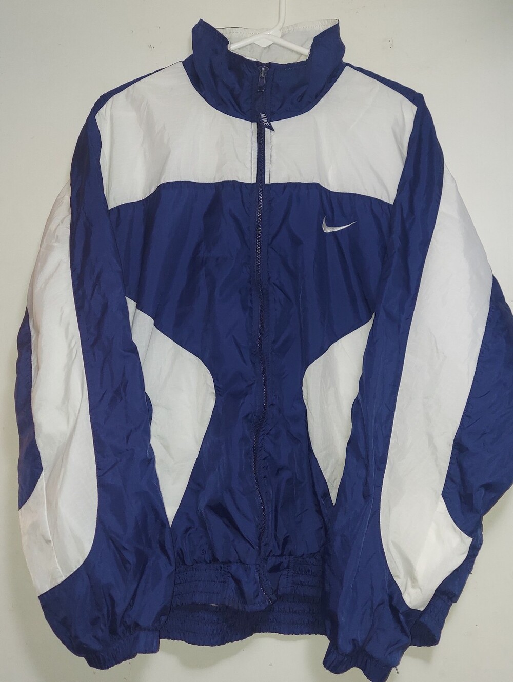 Vintage Nike Men’s Navy Blue and White Retro Windbreaker Jackets